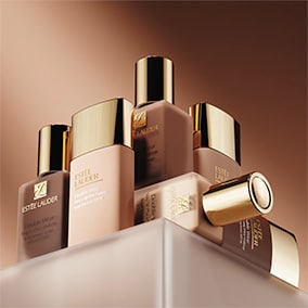 Double Wear Stay in Place and Double Wear Sheer bottles stacked on shelf