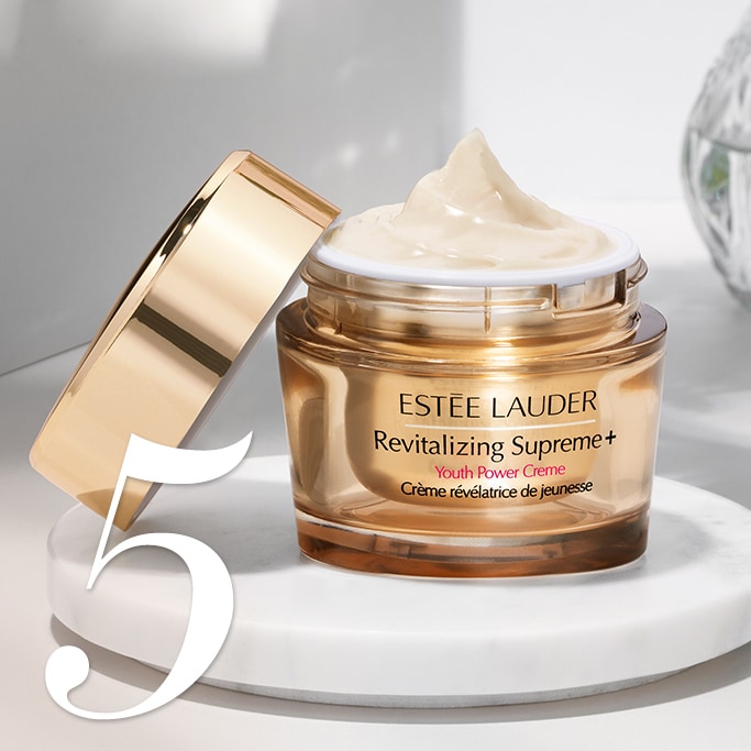 An open jar of Revitalizing Supreme moisturiser, showing the smooth texture